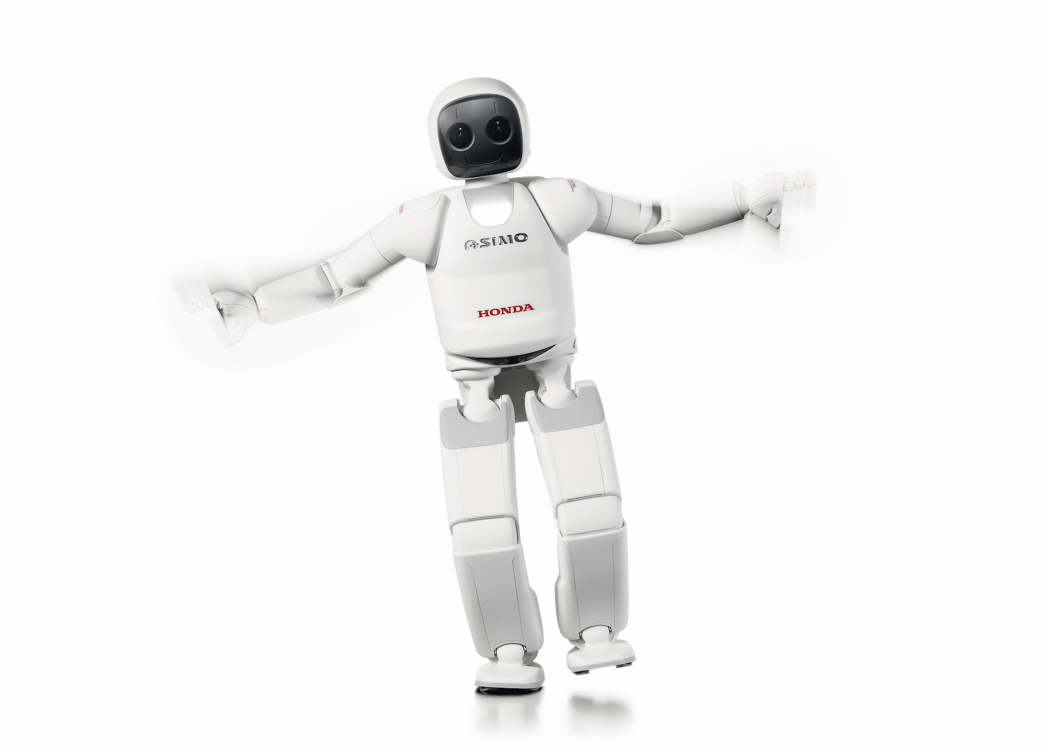 Japanese humanoid Asimo, with a white body that looks like an Astronaut suit, waves both arms while balancing on one foot.