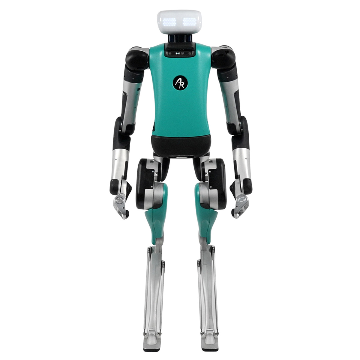 A humanoid robot about the size of an adult person, with a green and black body and a head with square eyes, stands facing forward.