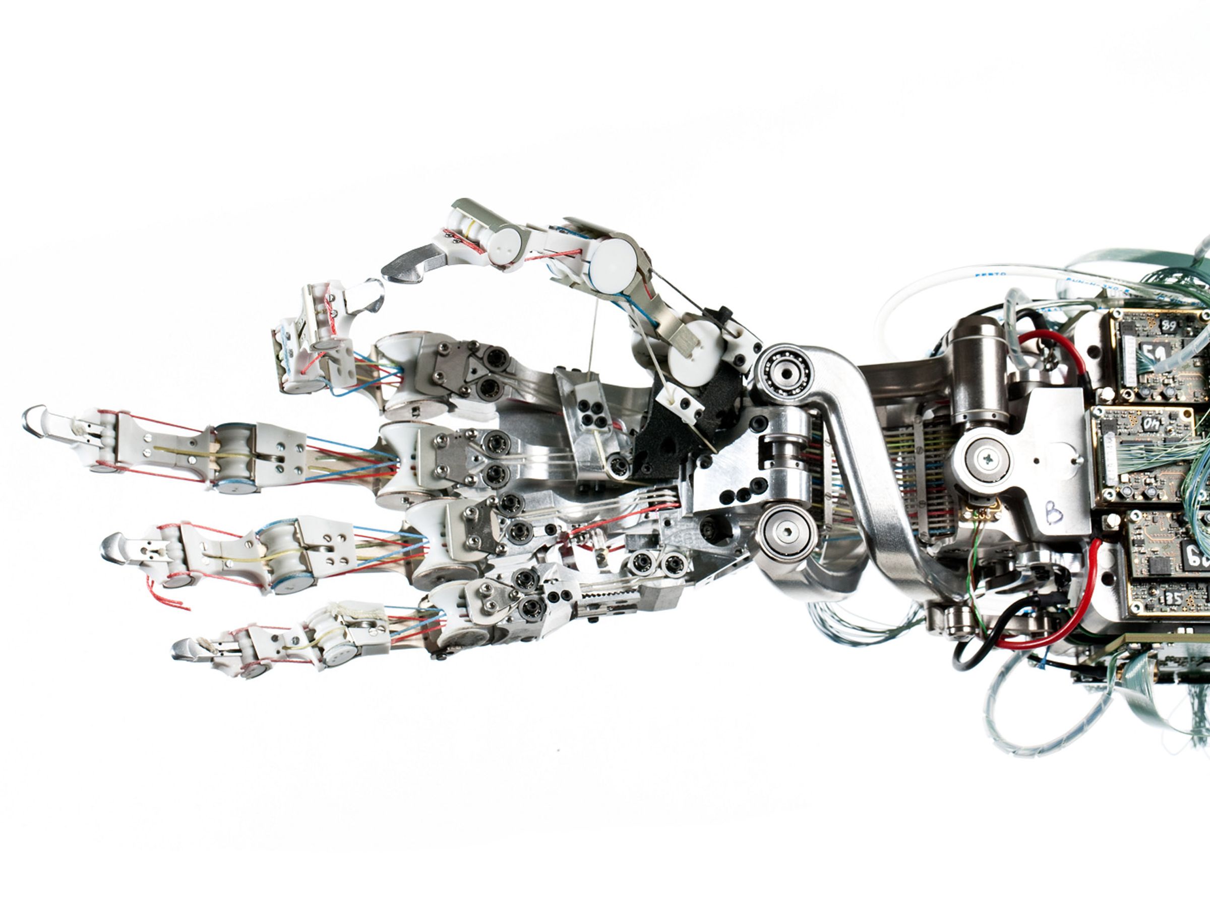 A robotic hand with five fingers actuated by thin colorful wires driven by motors housed on the forearm.