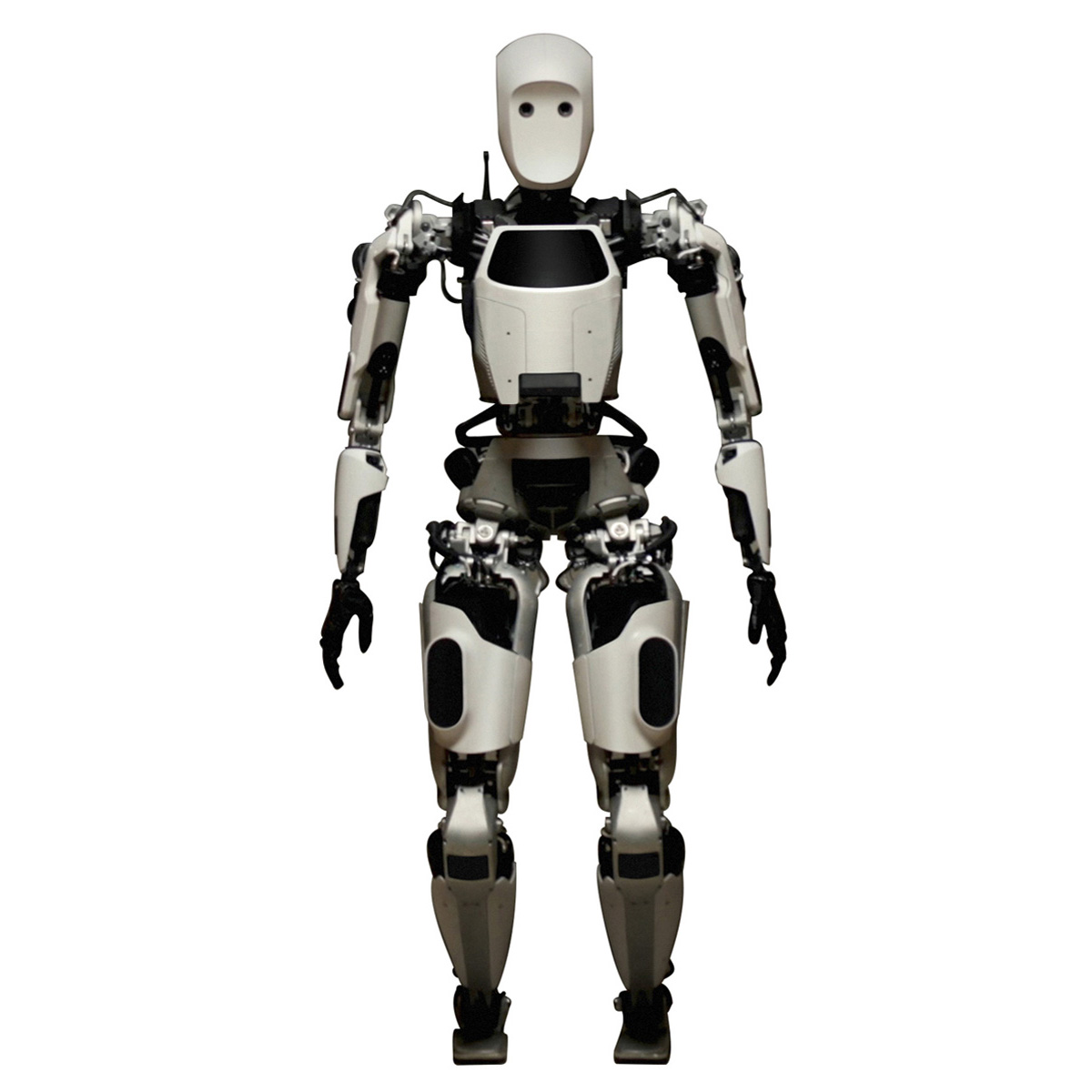 A humanoid robot about the size of an adult, with a beige and black body, person stands facing forward.