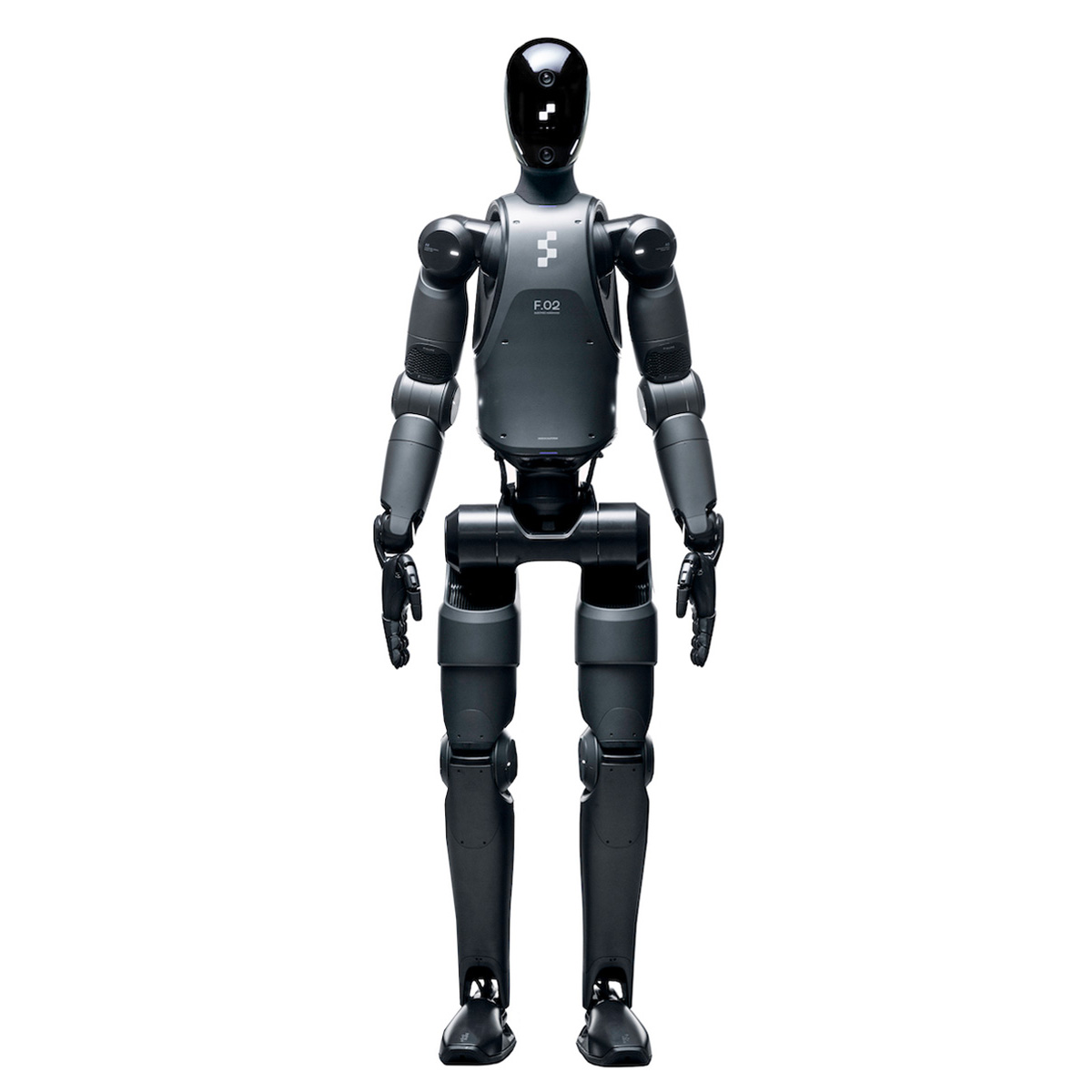 A humanoid robot about the size of an adult person, with a sleek dark gray body, stands facing forward.